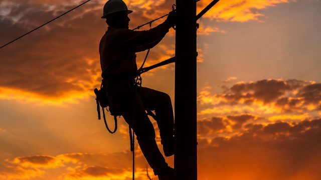 Elevate Your Space with Stunning Lineman Tribute Wallpapers